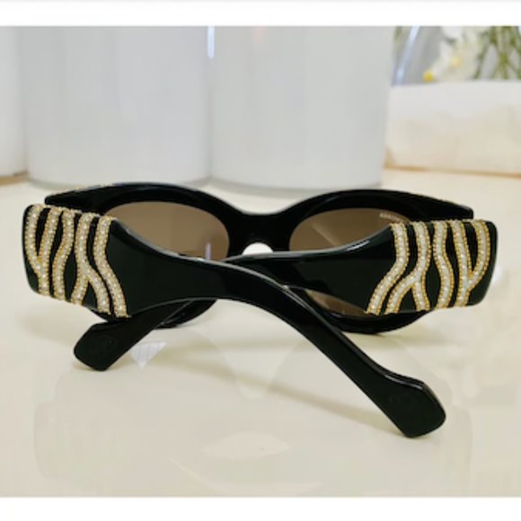 Balenciaga Black sunglasses studded with gold hardware and crystals main image 5